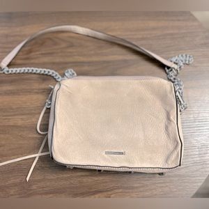 Very light pink suede Rebecca Minkoff crossbody with silver chain
